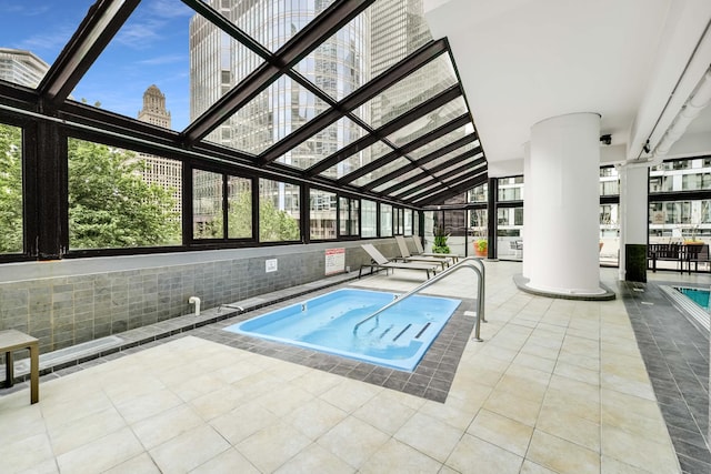 405 N Wabash Ave Unit 3403, Chicago, IL 60611 - indoor community pool featuring a city view and an indoor hot tub