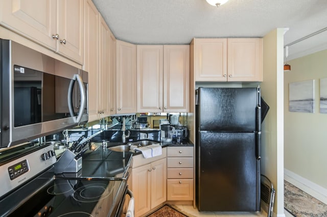 405 N Wabash Ave Unit 3403, Chicago, IL 60611 - kitchen with appliances with stainless steel finishes, a textured ceiling, light brown cabinets, and dark countertops