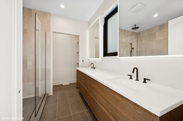 222 S Oakley Blvd Unit 3, Chicago, IL 60612 - full bathroom featuring a stall shower, double vanity, recessed lighting, tile patterned floors, and baseboards