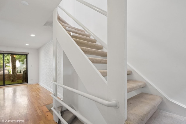 3759 N Kenmore Ave Unit A, Chicago, IL 60613 - stairway with wood finished floors and recessed lighting