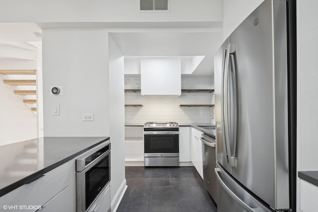 3759 N Kenmore Ave Unit A, Chicago, IL 60613 - kitchen featuring stainless steel appliances, open shelves, and white cabinetry