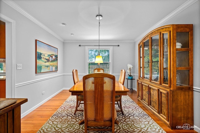 6382 Twin Oaks Ln, Lisle, IL 60532 - dining space with light wood-style flooring and crown molding
