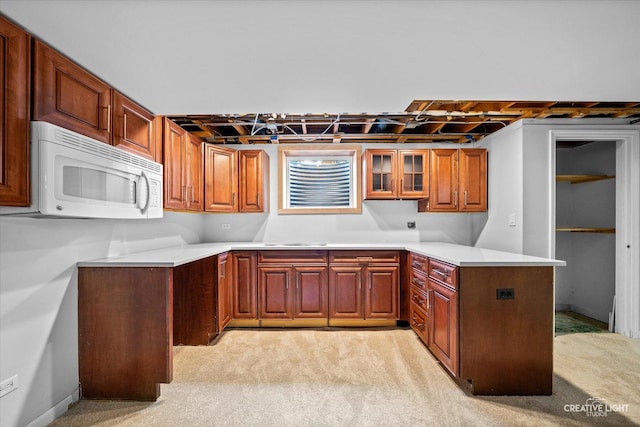 6382 Twin Oaks Ln, Lisle, IL 60532 - kitchen featuring white microwave, light colored carpet, a peninsula, and light countertops