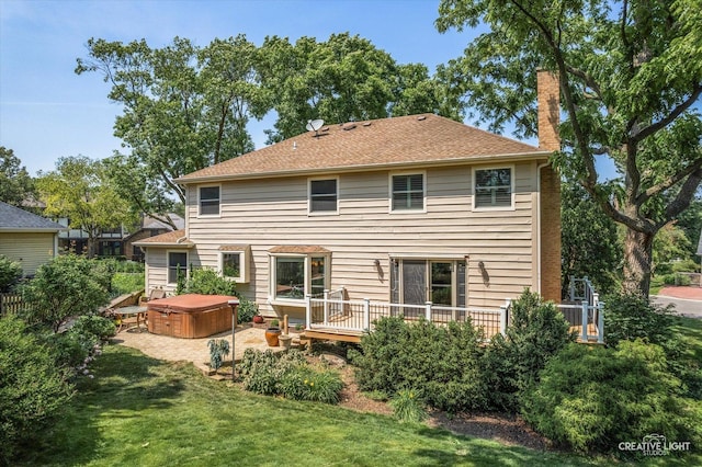 6382 Twin Oaks Ln, Lisle, IL 60532 - back of property featuring a hot tub, a chimney, a yard, and a wooden deck