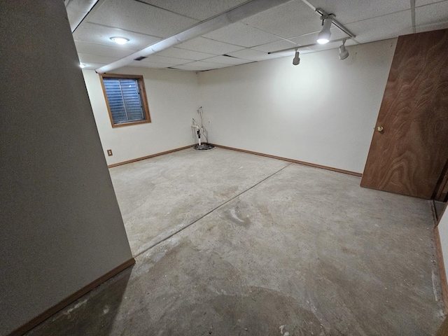 3238 Gresham Ln E, Aurora, IL 60504 - finished below grade area with baseboards, drainage system, and a drop ceiling