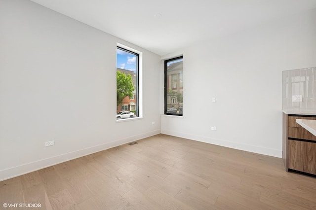 220 S Oakley Blvd, Chicago, IL 60612 - spare room with light wood finished floors and baseboards