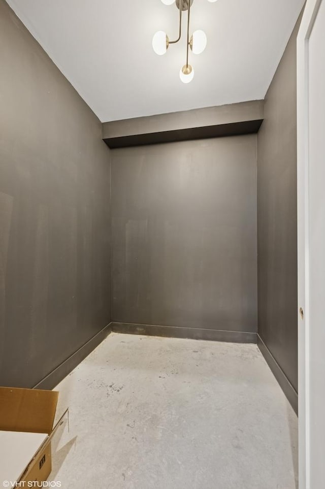 220 S Oakley Blvd, Chicago, IL 60612 - spare room featuring concrete floors and baseboards