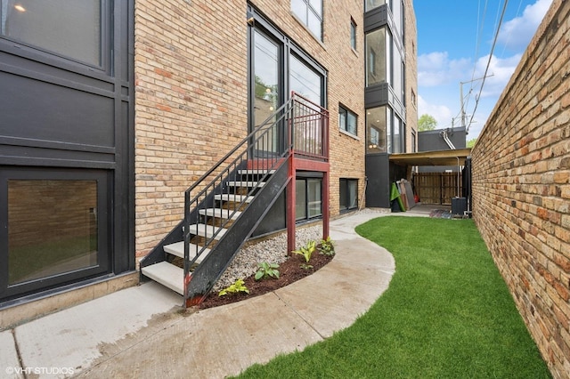 220 S Oakley Blvd, Chicago, IL 60612 - entrance to property with brick siding and a lawn