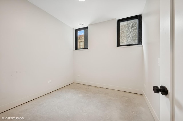 220 S Oakley Blvd, Chicago, IL 60612 - unfurnished room with baseboards and concrete floors
