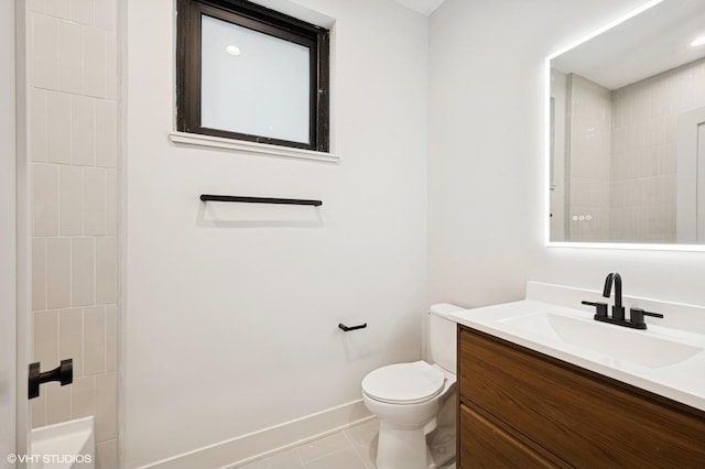 220 S Oakley Blvd, Chicago, IL 60612 - bathroom featuring vanity, toilet, baseboards, and tile patterned flooring