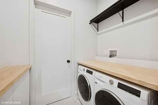 220 S Oakley Blvd, Chicago, IL 60612 - washroom with washer and clothes dryer and light tile patterned floors