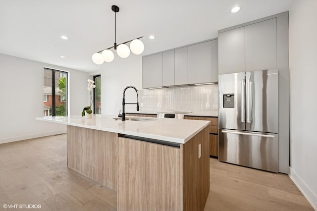 220 S Oakley Blvd, Chicago, IL 60612 - kitchen with stainless steel fridge, a sink, modern cabinets, tasteful backsplash, and recessed lighting