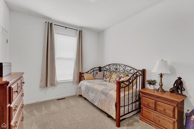 8716 Pebble Creek Ct, Wonder Lake, IL 60097 - bedroom featuring light carpet and baseboards