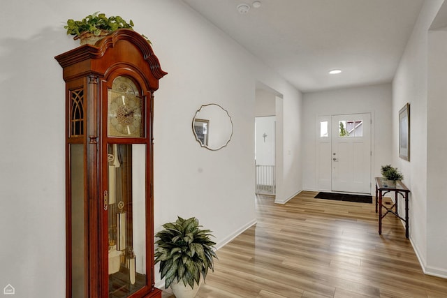 8716 Pebble Creek Ct, Wonder Lake, IL 60097 - entryway featuring light wood-style floors, baseboards, and recessed lighting