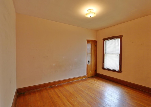4327 W Henderson St, Chicago, IL 60641 - unfurnished room featuring hardwood / wood-style floors and baseboards