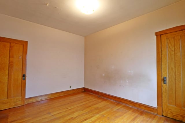 4327 W Henderson St, Chicago, IL 60641 - unfurnished room featuring light wood finished floors and baseboards