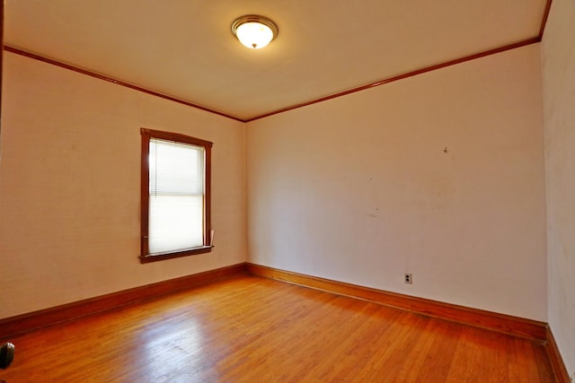 4327 W Henderson St, Chicago, IL 60641 - empty room with ornamental molding, wood finished floors, and baseboards