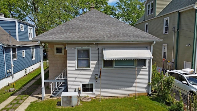 4327 W Henderson St, Chicago, IL 60641 - rear view of house featuring a shingled roof and stairway