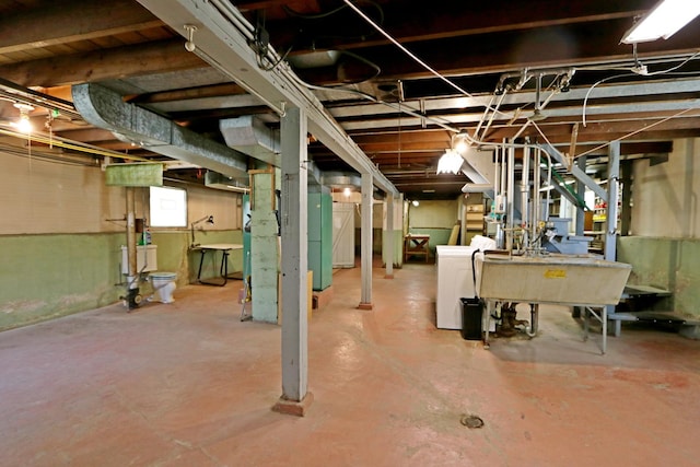 4327 W Henderson St, Chicago, IL 60641 - below grade area with washer / clothes dryer and a sink