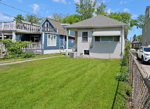 4327 W Henderson St, Chicago, IL 60641 - rear view of house featuring roof with shingles