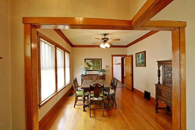 4327 W Henderson St, Chicago, IL 60641 - dining room with wood finished floors, ornamental molding, baseboards, and a ceiling fan