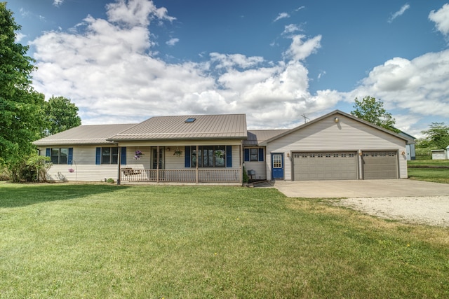 12578 Prairie Center Rd, Morrison, IL 61270 - ranch-style home with a porch, driveway, a garage, a front yard, and metal roof