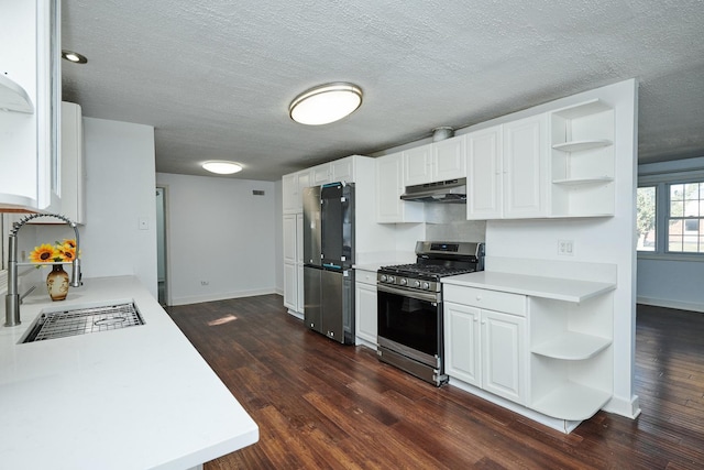 1613 Hartmann Dr, Schaumburg, IL 60193 - kitchen featuring stainless steel appliances, open shelves, under cabinet range hood, baseboards, and a textured ceiling
