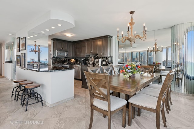 505 N Lake Shore Dr Unit 4807, Chicago, IL 60611 - dining space with a chandelier and light marble finish floors