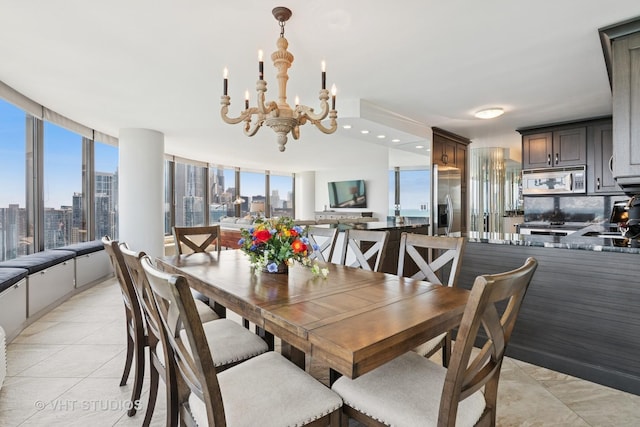505 N Lake Shore Dr Unit 4807, Chicago, IL 60611 - dining area featuring a chandelier, light tile patterned floors, and a view of city