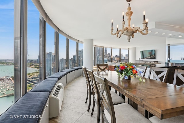 505 N Lake Shore Dr Unit 4807, Chicago, IL 60611 - dining room featuring a chandelier, healthy amount of natural light, a water view, light tile patterned flooring, and recessed lighting