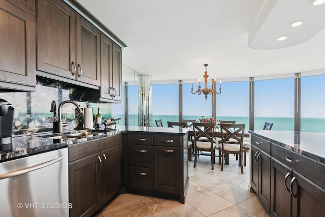 505 N Lake Shore Dr Unit 4807, Chicago, IL 60611 - kitchen featuring a sink, dishwasher, dark stone counters, dark brown cabinets, and a chandelier