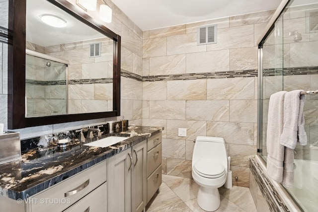 505 N Lake Shore Dr Unit 4807, Chicago, IL 60611 - full bathroom with tile walls, vanity, toilet, tiled shower / bath, and marble finish flooring