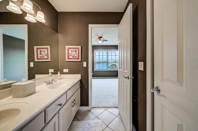 22802 Eider Ct, Plainfield, IL 60585 - bathroom with double vanity, tile patterned floors, a ceiling fan, and baseboards