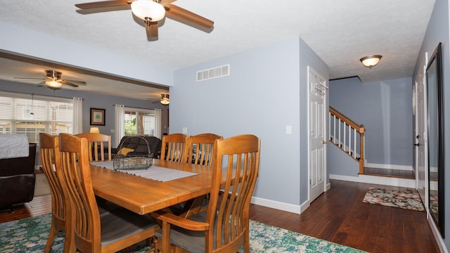 302 Gambel Ct, Normal, IL 61761 - dining room featuring a ceiling fan, baseboards, stairs, hardwood / wood-style flooring, and a textured ceiling