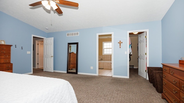 302 Gambel Ct, Normal, IL 61761 - bedroom with carpet flooring, baseboards, a walk in closet, ensuite bath, and ceiling fan