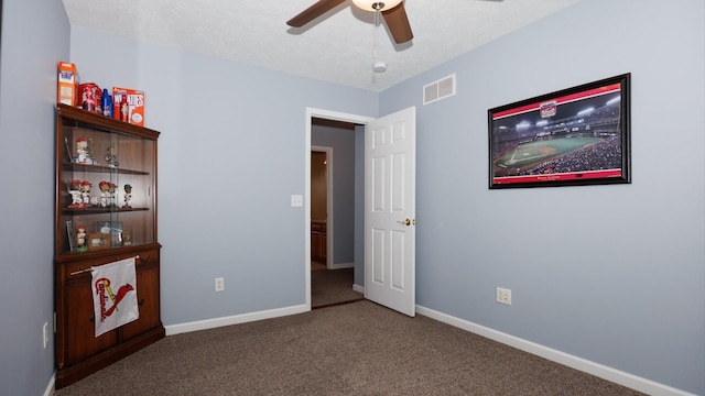 302 Gambel Ct, Normal, IL 61761 - unfurnished bedroom featuring carpet, baseboards, and a ceiling fan