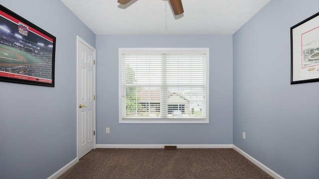 302 Gambel Ct, Normal, IL 61761 - spare room with carpet, a ceiling fan, and baseboards