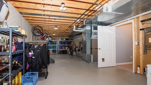 302 Gambel Ct, Normal, IL 61761 - below grade area featuring heating unit and baseboards