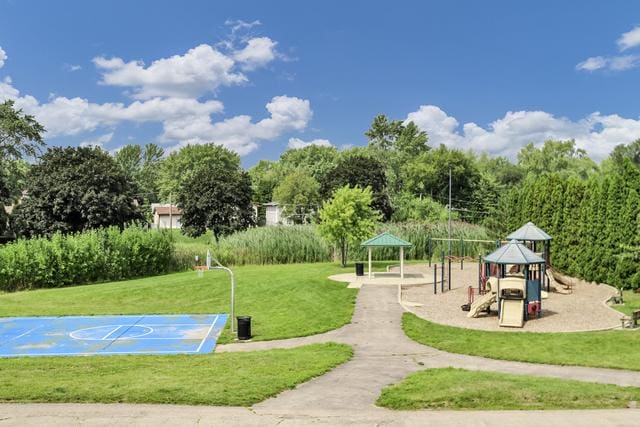 view of community featuring a yard, community basketball court, and a gazebo
