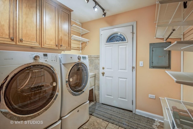 1109 Danvers Ct, Schaumburg, IL 60193 - washroom featuring washing machine and dryer, tile patterned floors, electric panel, cabinet space, and tile walls
