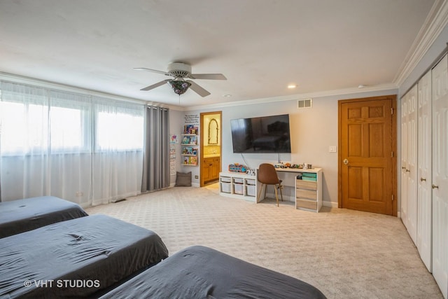 1109 Danvers Ct, Schaumburg, IL 60193 - bedroom featuring crown molding, baseboards, light colored carpet, a ceiling fan, and a closet