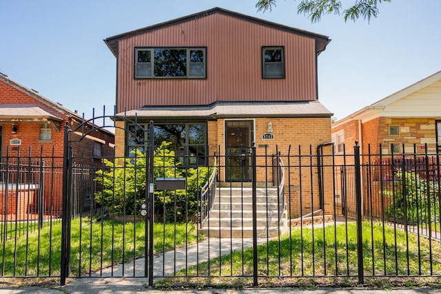 8743 S Constance Ave, Chicago, IL 60617 - view of front facade with a fenced front yard and a gate
