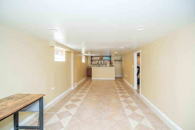 8743 S Constance Ave, Chicago, IL 60617 - basement featuring recessed lighting, light tile patterned floors, and baseboards