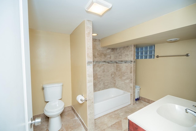 8743 S Constance Ave, Chicago, IL 60617 - bathroom with toilet, vanity, shower / washtub combination, tile patterned flooring, and baseboards