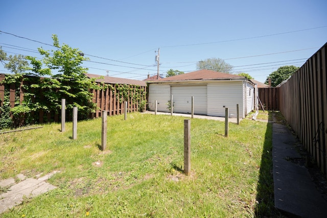 8743 S Constance Ave, Chicago, IL 60617 - view of yard with a garage and an outbuilding