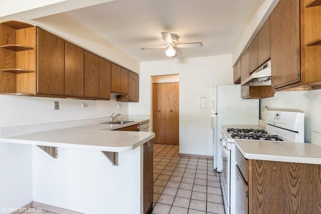 942 E Old Willow Rd Unit 101, Prospect Heights, IL 60070 - kitchen featuring white gas range oven, open shelves, under cabinet range hood, and a ceiling fan