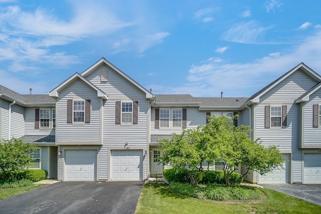 1163 Whispering Hills Dr, Naperville, IL 60540 - townhome / multi-family property with driveway, a garage, and a shingled roof
