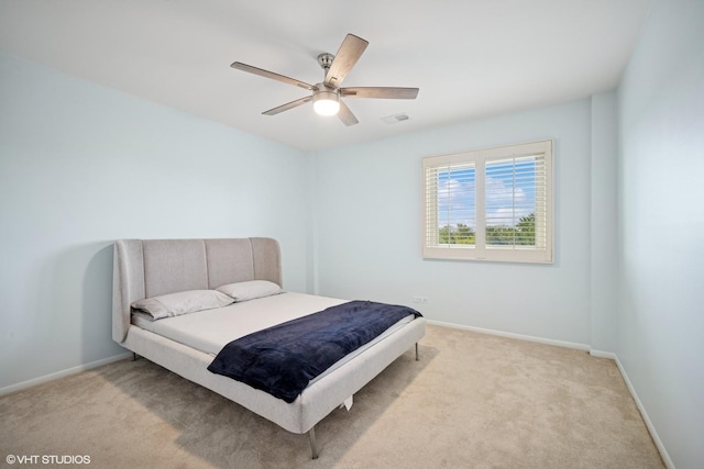407 Ashland Ave Unit 6H, River Forest, IL 60305 - bedroom with baseboards, light carpet, and a ceiling fan