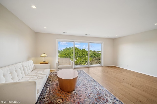 407 Ashland Ave Unit 6H, River Forest, IL 60305 - living area featuring wood finished floors, baseboards, and recessed lighting