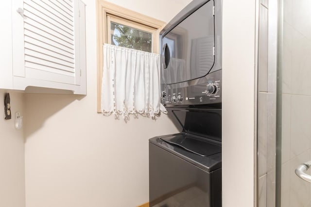 2321 Woodhavens Dr, Bloomington, IL 61701 - laundry area featuring stacked washer and clothes dryer